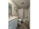 Well-lit bathroom with a white vanity and a shower-tub combination at 17255 Seaboard Pl, Noblesville, IN 46060