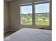 Bright bedroom with a view, featuring a comfortable bed and a serene ambiance at 17255 Seaboard Pl, Noblesville, IN 46060