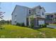 Well-maintained two-story home with brick and siding exterior and landscaped front yard at 17255 Seaboard Pl, Noblesville, IN 46060