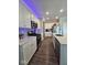 Bright kitchen with stainless steel appliances and a spacious island with seating at 17255 Seaboard Pl, Noblesville, IN 46060
