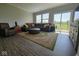 Cozy living room with plush seating and natural light, perfect for relaxation at 17255 Seaboard Pl, Noblesville, IN 46060