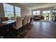 Open-concept space integrating dining and living areas with ample natural light at 17255 Seaboard Pl, Noblesville, IN 46060