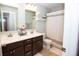 Bathroom showcasing double vanity, mirror, shower, and neutral decor at 18297 Rickety Dr, Westfield, IN 46074