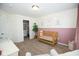 Cozy Bedroom with crib, closet, and charming wall decor, perfect for a newborn at 18297 Rickety Dr, Westfield, IN 46074
