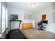 Neutral office space featuring a treadmill, desk, and modern decor at 18297 Rickety Dr, Westfield, IN 46074