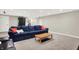 Finished basement with neutral carpet and a comfortable seating area at 1898 Corniche Dr, Zionsville, IN 46077