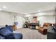 Spacious basement with carpet flooring perfect for a music room, complete with instruments and seating at 1898 Corniche Dr, Zionsville, IN 46077