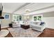 Cozy living room with large sectional sofa, stylish rug, and plenty of natural light at 1898 Corniche Dr, Zionsville, IN 46077