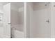 Bathroom with a soaking tub, separate shower, and tile surround at 1903 Windy Hill Ln, Indianapolis, IN 46239