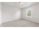 This room has plush neutral carpeting and a window that gives lots of natural light at 1903 Windy Hill Ln, Indianapolis, IN 46239