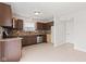 Functional kitchen with stainless steel appliances and tile flooring at 1903 Windy Hill Ln, Indianapolis, IN 46239