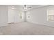 Neutral living room with carpeting, natural light, ceiling fan, and white paint at 1903 Windy Hill Ln, Indianapolis, IN 46239