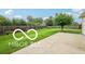 Spacious backyard featuring well-maintained lawn and mature tree at 19146 Carol Cove Cir, Noblesville, IN 46062