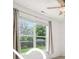 This bedroom has neutral walls, one double hung window, and a ceiling fan at 19146 Carol Cove Cir, Noblesville, IN 46062