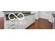 Updated kitchen with modern sink, white cabinets, and stainless steel appliances at 19146 Carol Cove Cir, Noblesville, IN 46062