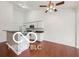 Open kitchen with white cabinets and island at 19146 Carol Cove Cir, Noblesville, IN 46062
