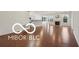 Spacious living room boasts hardwood floors, natural light, and a fireplace at 19146 Carol Cove Cir, Noblesville, IN 46062