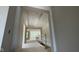 Hallway view with tray ceiling and plenty of natural light, new construction at 1960 Delp Ct, Avon, IN 46123