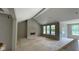Spacious living room with fireplace, large windows providing great light at 1960 Delp Ct, Avon, IN 46123