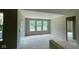 Bright living room featuring a large window arrangement with exterior views at 1960 Delp Ct, Avon, IN 46123