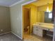 Bathroom with a single sink vanity and tile flooring, offering functionality at 2017 Schwier Ct, Indianapolis, IN 46229