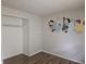 Bedroom with monster mural on the wall and wood floors at 2017 Schwier Ct, Indianapolis, IN 46229