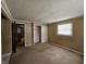 Neutral-colored bedroom with large closet and textured ceiling design at 2017 Schwier Ct, Indianapolis, IN 46229