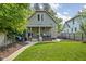 Inviting backyard with a cozy porch, perfect for outdoor relaxation and entertaining at 2158 S Garfield Dr, Indianapolis, IN 46203