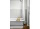 Close up of bathroom featuring a vintage tub, and beadboard paneling at 2158 S Garfield Dr, Indianapolis, IN 46203