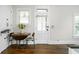 Charming dining area with natural light and hardwood floors at 2158 S Garfield Dr, Indianapolis, IN 46203