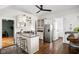 Bright, updated kitchen with stainless steel appliances, ample cabinetry, and an island at 2158 S Garfield Dr, Indianapolis, IN 46203