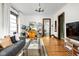 Cozy living room with hardwood floors, ample natural light, and stylish furnishings at 2158 S Garfield Dr, Indianapolis, IN 46203