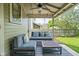 Relaxing porch with stylish furniture and a view of the well-maintained backyard at 2158 S Garfield Dr, Indianapolis, IN 46203