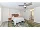 Comfortable bedroom with a neutral color scheme, modern lighting, and decor rug at 2433 Hideaway S Dr, Indianapolis, IN 46268