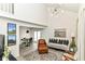 Spacious living room with vaulted ceilings, slider doors, and a decorative rug at 2433 Hideaway S Dr, Indianapolis, IN 46268