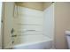 White tub and shower combination featuring an adjustable shower head at 2434 Harvest Moon Dr, Greenwood, IN 46143
