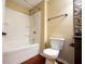 Clean bathroom featuring a white bathtub with shower and modern toilet and vanity at 2434 Harvest Moon Dr, Greenwood, IN 46143