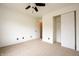 Bedroom featuring neutral-toned walls and carpet, bright window, and closet at 2434 Harvest Moon Dr, Greenwood, IN 46143