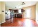 Modern kitchen with stainless steel appliances, dark wood cabinets, and stylish backsplash at 2434 Harvest Moon Dr, Greenwood, IN 46143