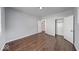Bright bedroom featuring wood floors, a closet, and a doorway at 244 W 31St St, Indianapolis, IN 46208