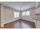 Charming dining room boasting hardwood floors, two windows, and pendant lighting at 244 W 31St St, Indianapolis, IN 46208