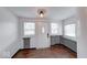 Inviting foyer with new floors, large windows, and plenty of sunlight at 244 W 31St St, Indianapolis, IN 46208