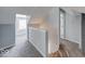 This carpeted hallway connects two bedrooms at 244 W 31St St, Indianapolis, IN 46208