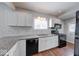 Well-appointed kitchen featuring granite countertops, modern appliances, and ample storage at 244 W 31St St, Indianapolis, IN 46208