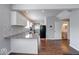 Modern kitchen featuring granite countertops, sleek appliances, and breakfast bar seating at 244 W 31St St, Indianapolis, IN 46208