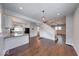 Open-concept living area with hardwood floors and staircase, perfect for entertaining at 244 W 31St St, Indianapolis, IN 46208
