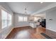 Spacious living area with large windows, open layout, and seamless flow to the kitchen at 244 W 31St St, Indianapolis, IN 46208