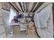 Cluttered unfinished basement shows storage challenges and opportunity for customization at 2502 Colinbrook Pkwy, Greenwood, IN 46143