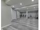 Finished basement with new luxury vinyl flooring, recessed lighting, and neutral paint at 2502 Colinbrook Pkwy, Greenwood, IN 46143