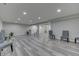 Spacious basement featuring luxury vinyl flooring, recessed lights, and neutral wall color at 2502 Colinbrook Pkwy, Greenwood, IN 46143